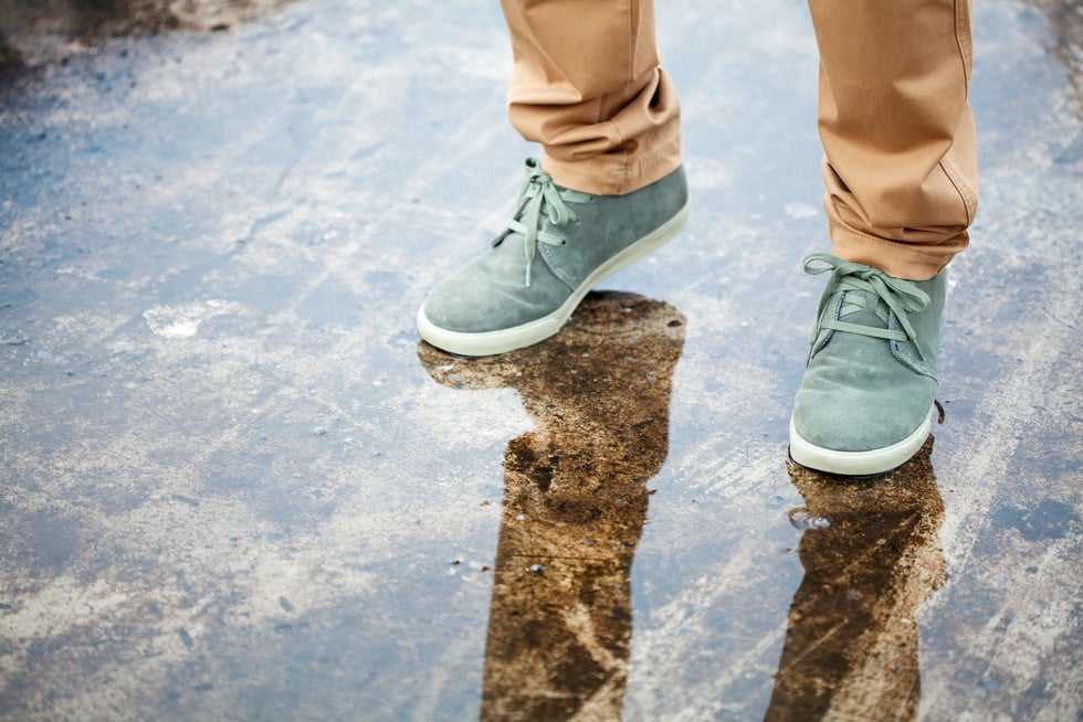 green shoe on water